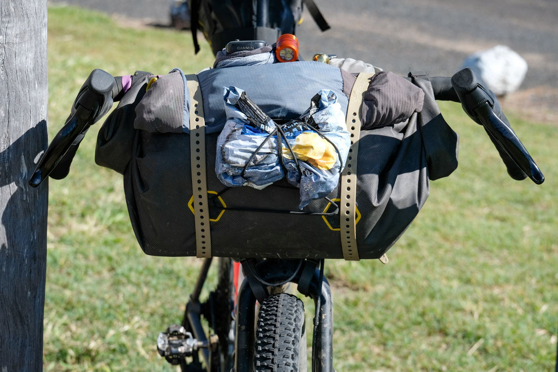 Curve Big Kev with a Laptop packed inside an Apidura Handlebar Bag